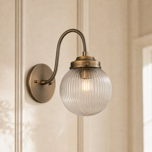 Wesley Antique Brass Ribbed Glass Globe Wall Light
